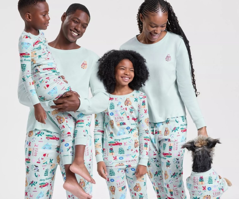 a family wearing matching pjs