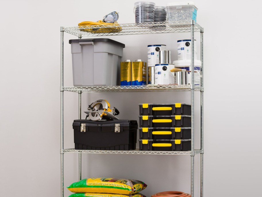 four piece shelving with items on it