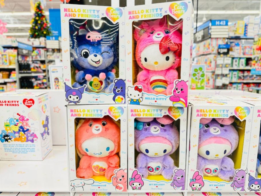 hello kitty and friends plush dolls wearin care bears costumes stacked in a store display