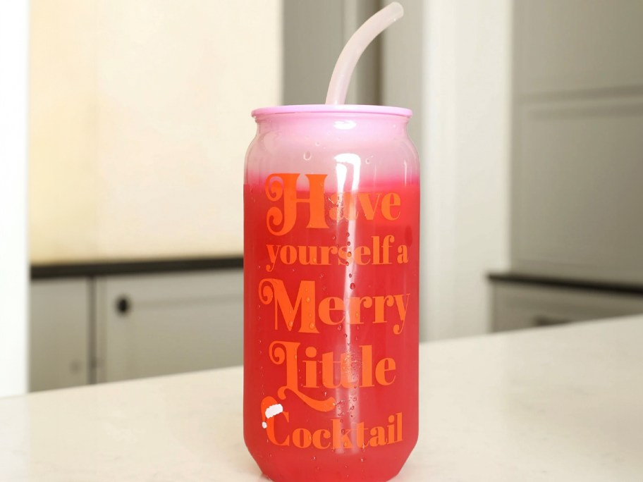 merry red tumbler on table