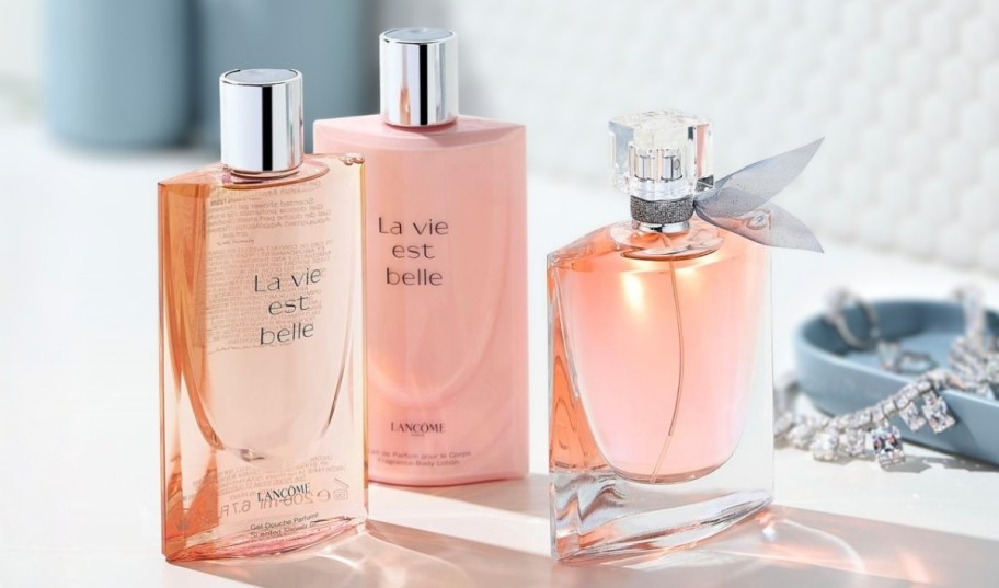 bottles of perfume, shower gel and body lotion