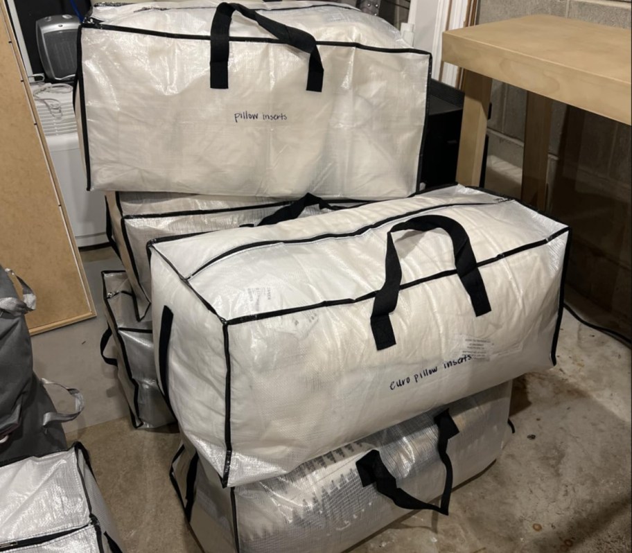 large moving bags stacked 