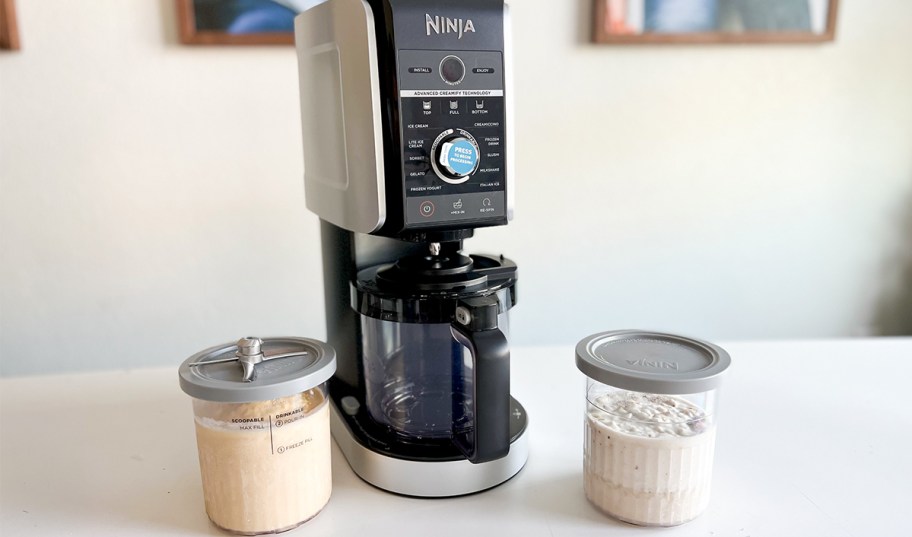 ninja creami machine and pints on table