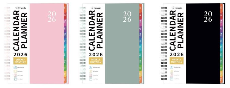 a pink, green, and black planner