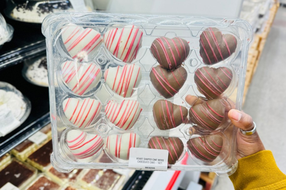 hand holding heart shaped cake bites