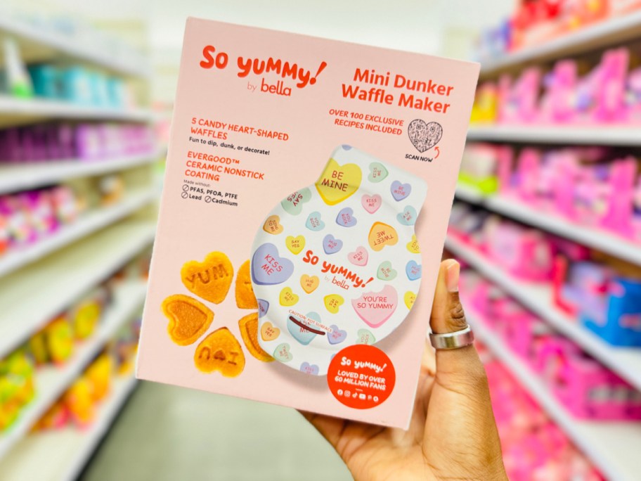 hand holding mini waffle maker in target store