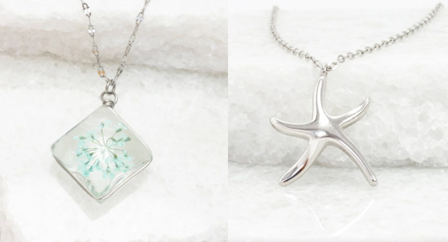 silver necklace with flower in it and silver starfish necklace