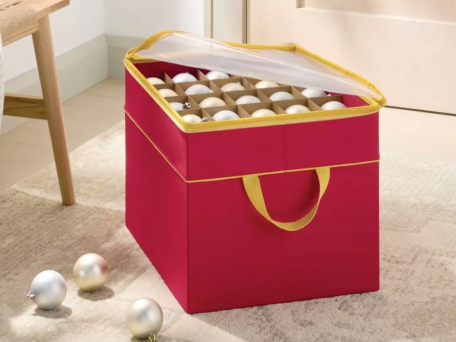 soft red bin with ornaments inside
