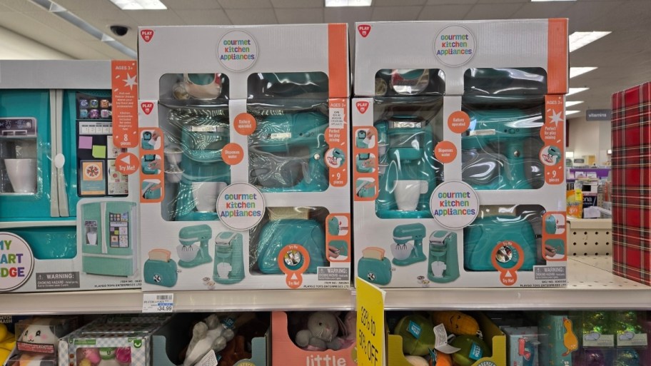 toy kitchen appliances on a store shelf