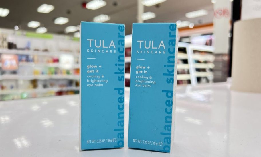 two boxes of tula eye balm on a store countertop