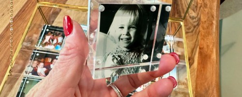 black and white photo of a toddler depicted on a walgreens photo block