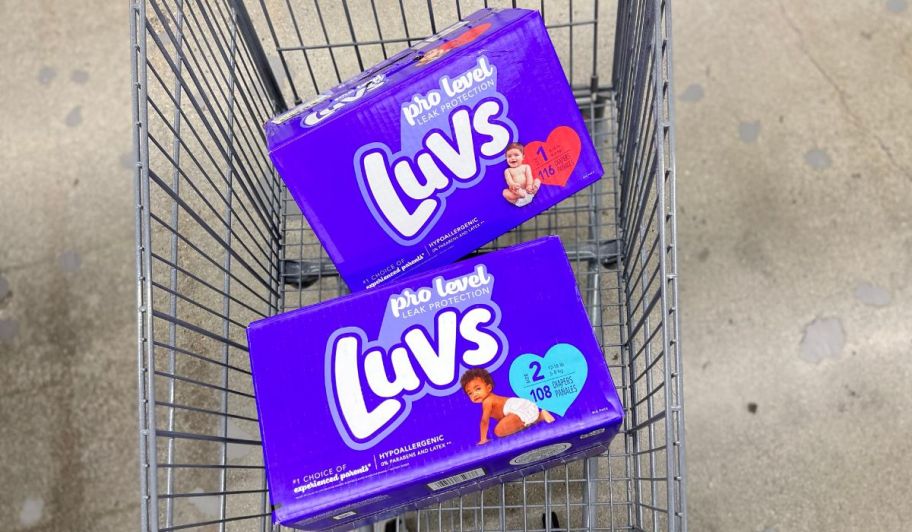 two boxes of luvs diapers in shopping cart 