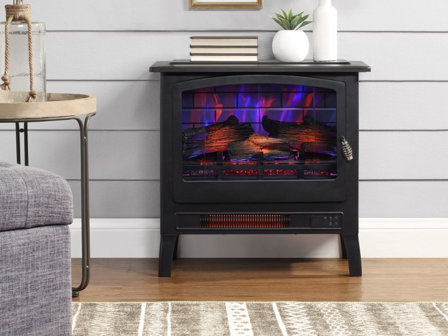 electric fireplace heater with purple flames