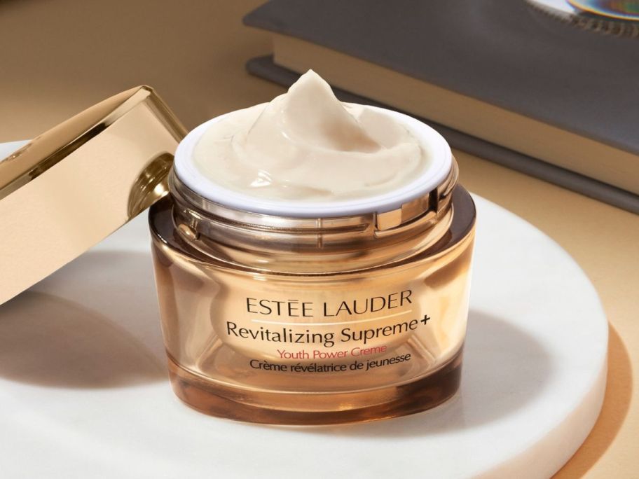 An open jar of Estee Lauder Revitalizing Supreme+ Youth Power Cream Moisturizer