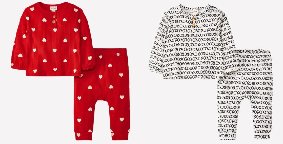 2 set of baby clothing outfits, one is red with white hearts, and one is cream with black XOXO all over it