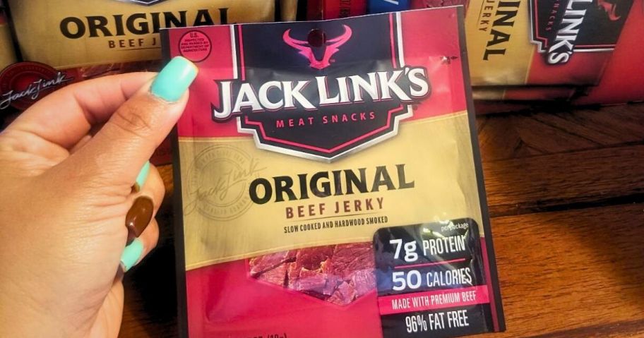 Hand holding a Jack Link's Beef Jerky Lunch Pack