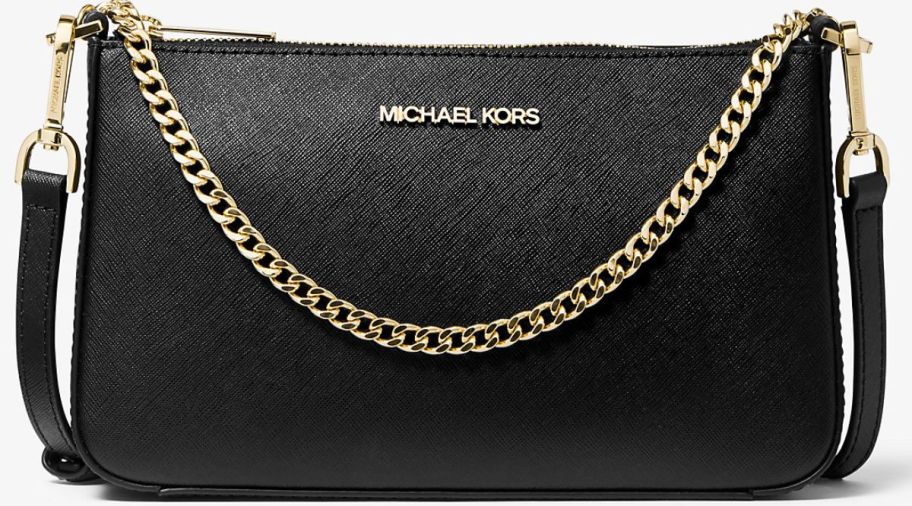 a medium black leather crossbody handbag with a chain strap.