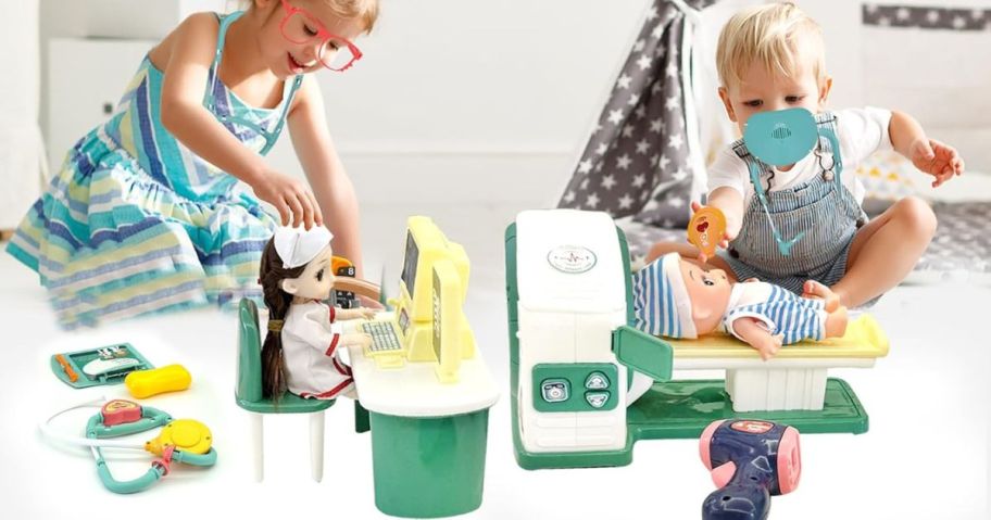 Kids playing with a realistic dr playset with dolls and an MRI machine