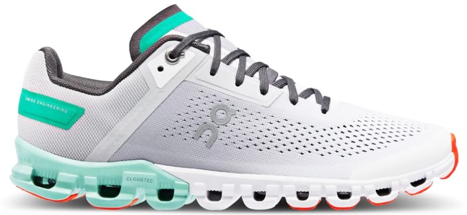 white, teal, and orange running shoe