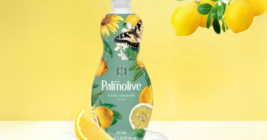 bottle of palmolive fresh lemonade scented dish soap with lemons and yellow background