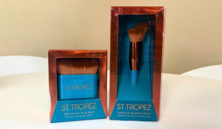 St tropez tanning brushes displayed on top of the table