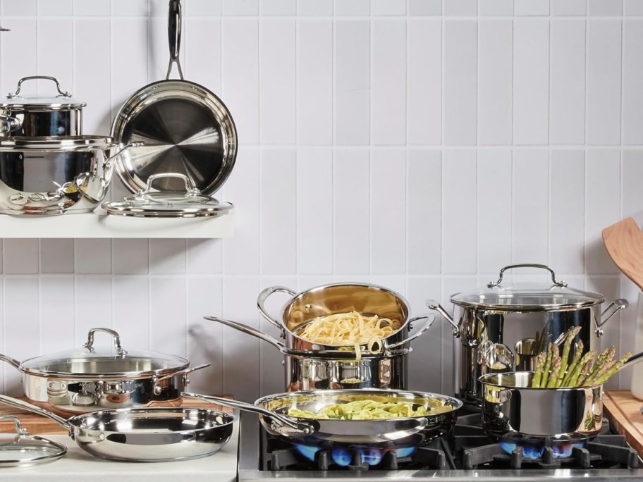 Stainless steel cookware displayed on top of the stove