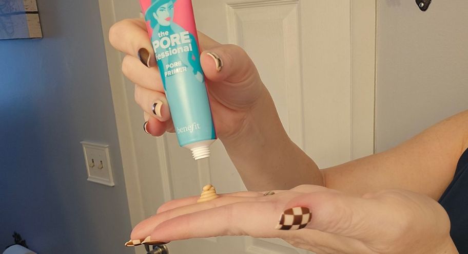 hand sticking out pouring porefessional primer 