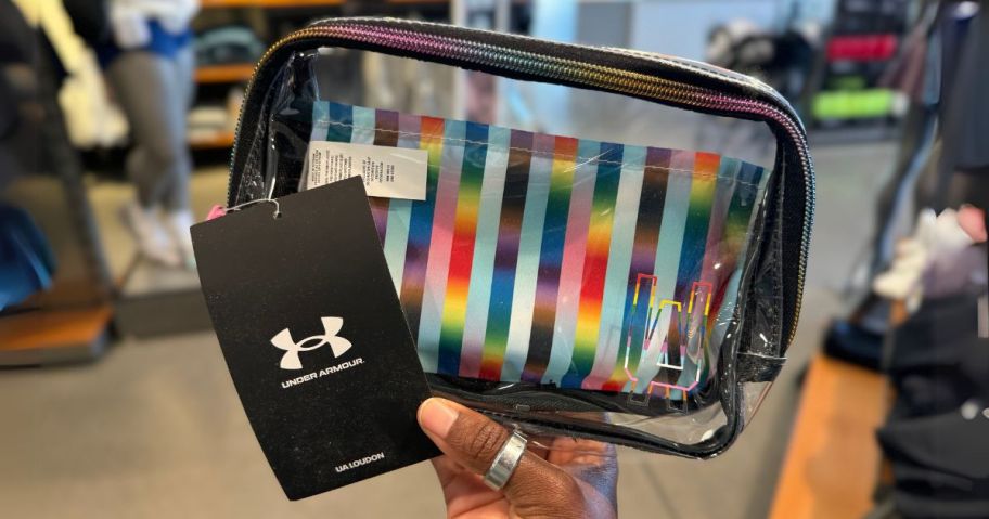 Under Armour Loudon Pride Waist Bag Crossbody in hand in store