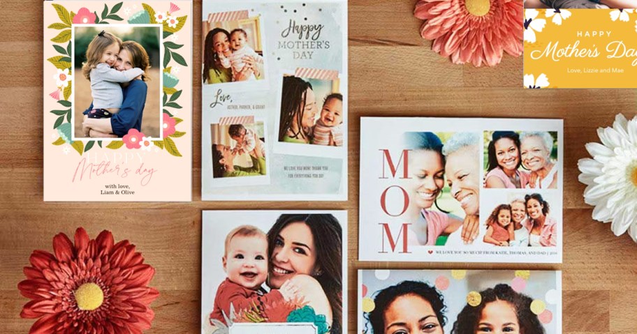 various custom photo mothers day cards on a wood table