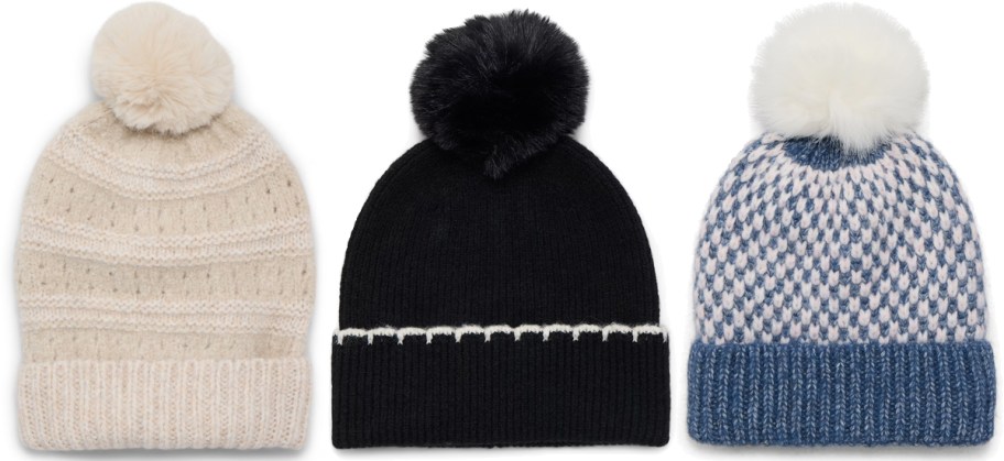 white, black, and blue beanies in a row