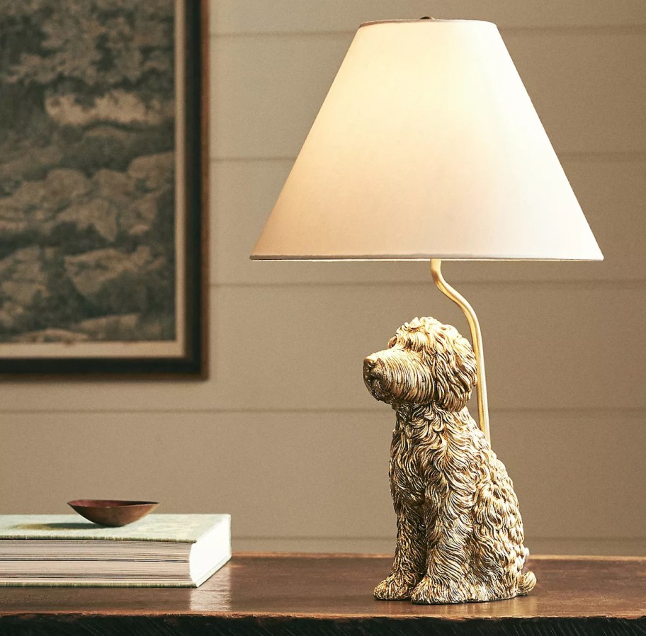 dog lamp on wood table with light on