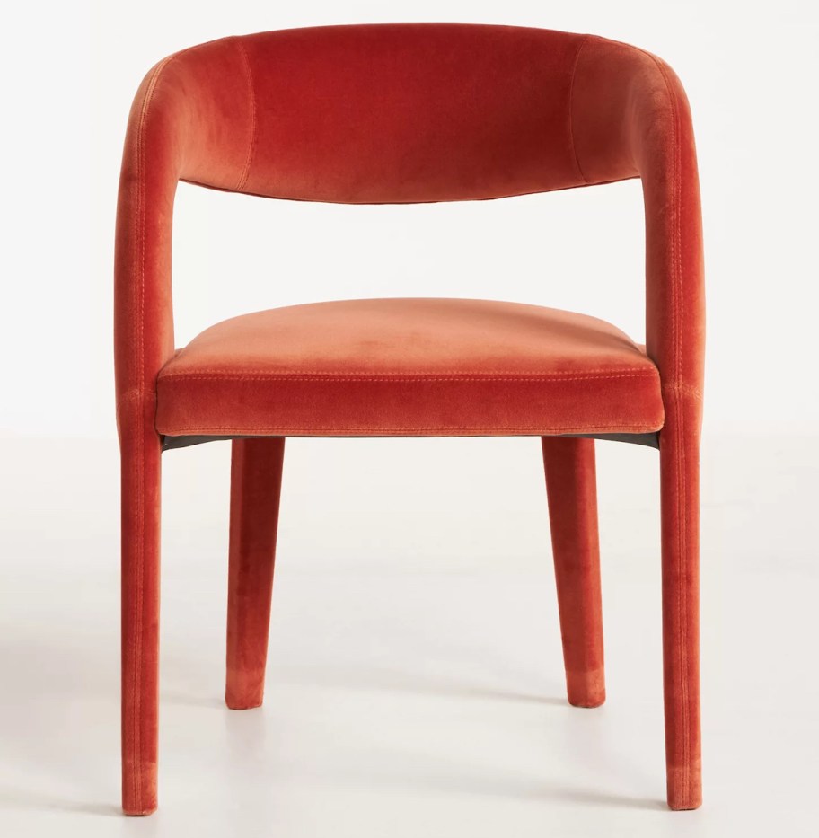 red velvet dining chair stock photo