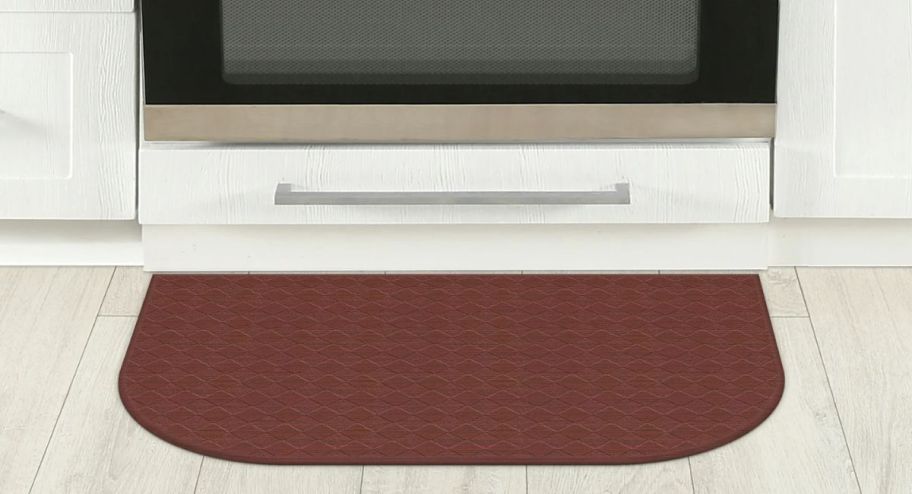 kitchen burgundy mat underneath the stove