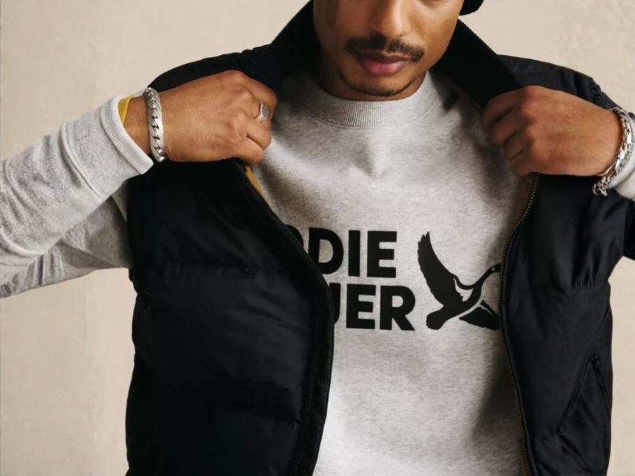 man wearing eddie bauer vest