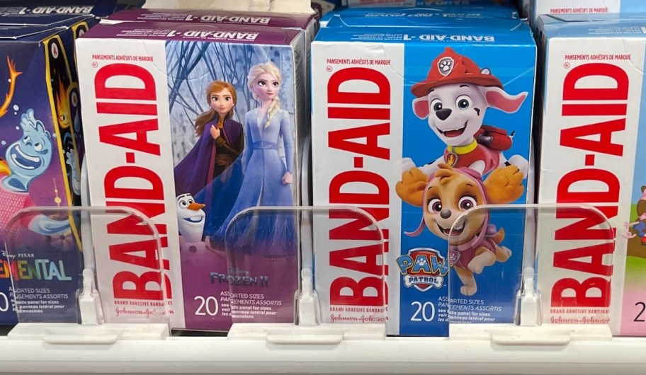 two boxes of character band-aids