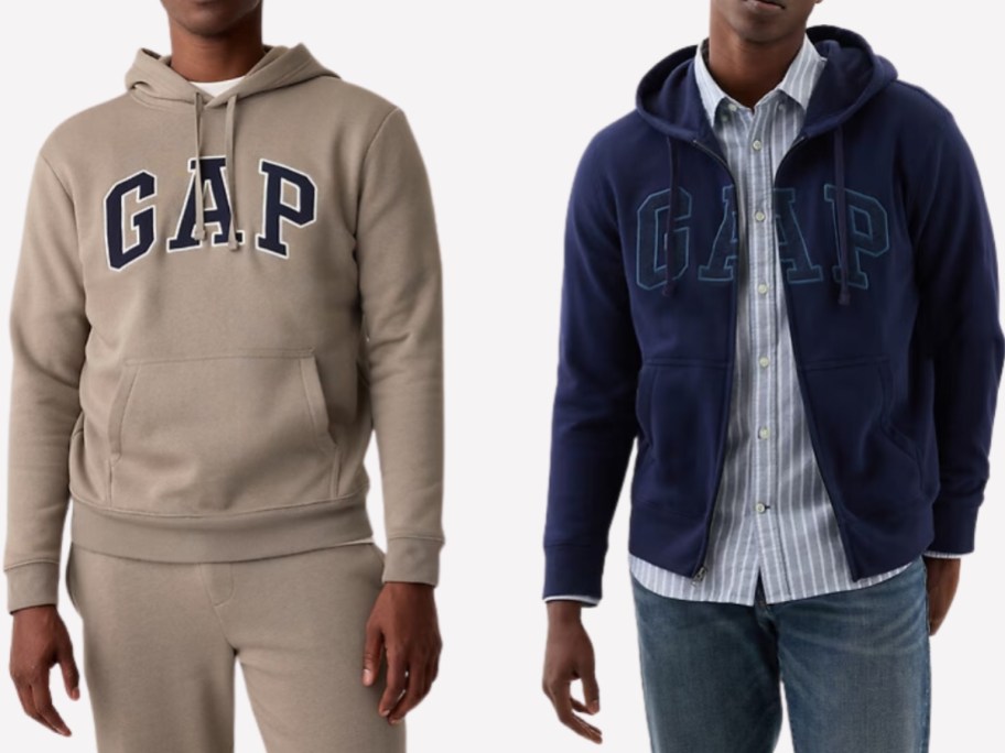A man wearing a tan GAP logo hoodie and a man wearing a blue zip-up GAP logo hoodie.