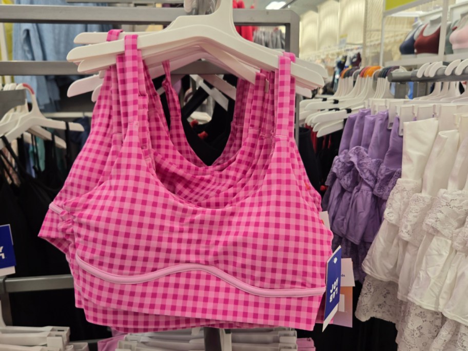 A pink gingham bra on a rack on Target.
