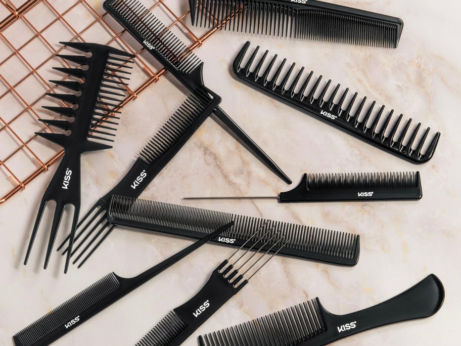 10 black combs in bag laid out on table