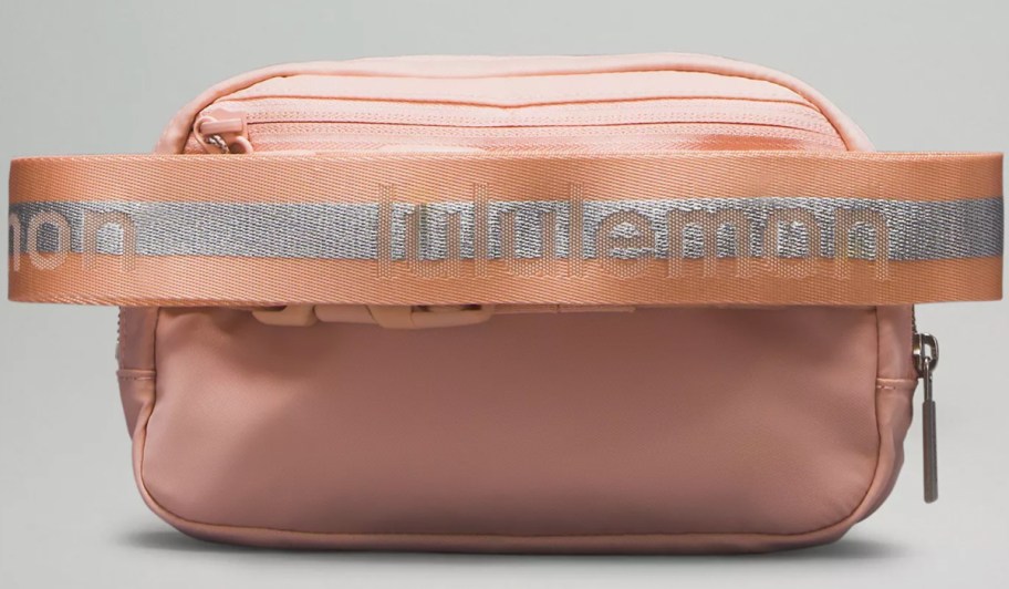 pink lululemon wordmark belt bag