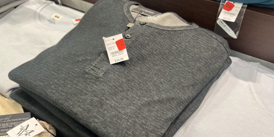 gray mens wearhouse tee on display