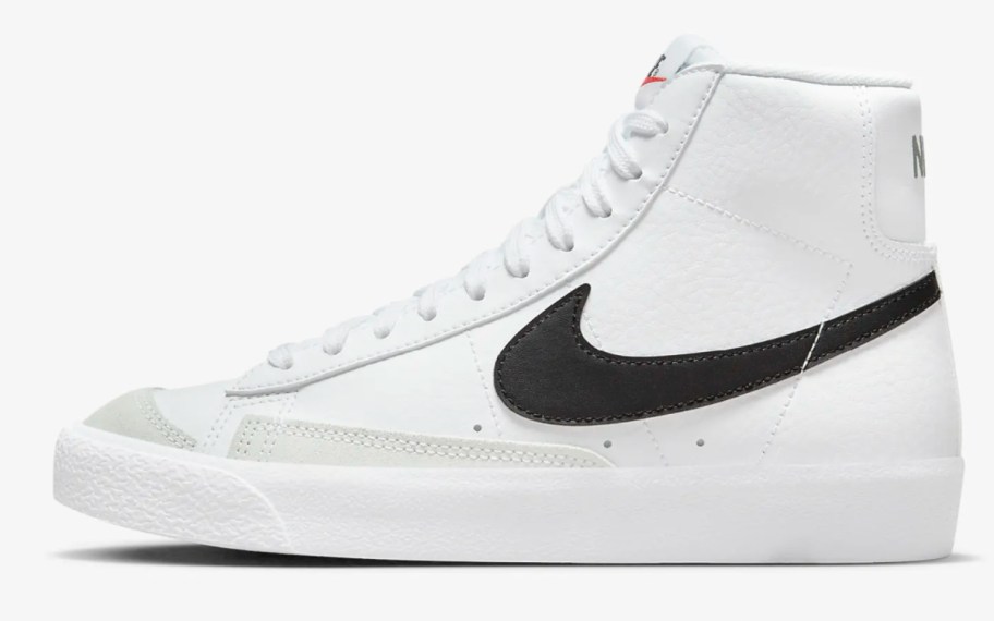 white high top shoes with black swoosh sign