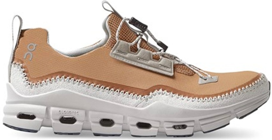 tan and white on cloud running shoe