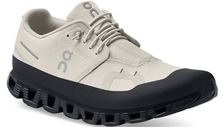 beige and black on cloud running shoe