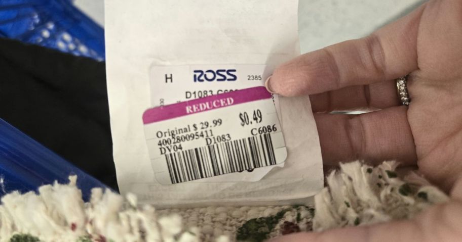 ross sales tag in hand in store