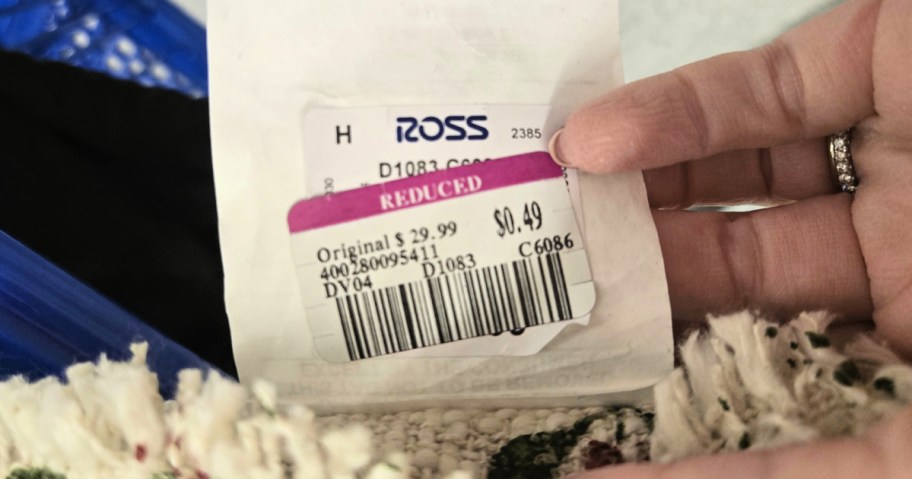 hand lifting a ross 49 cent markdown tag