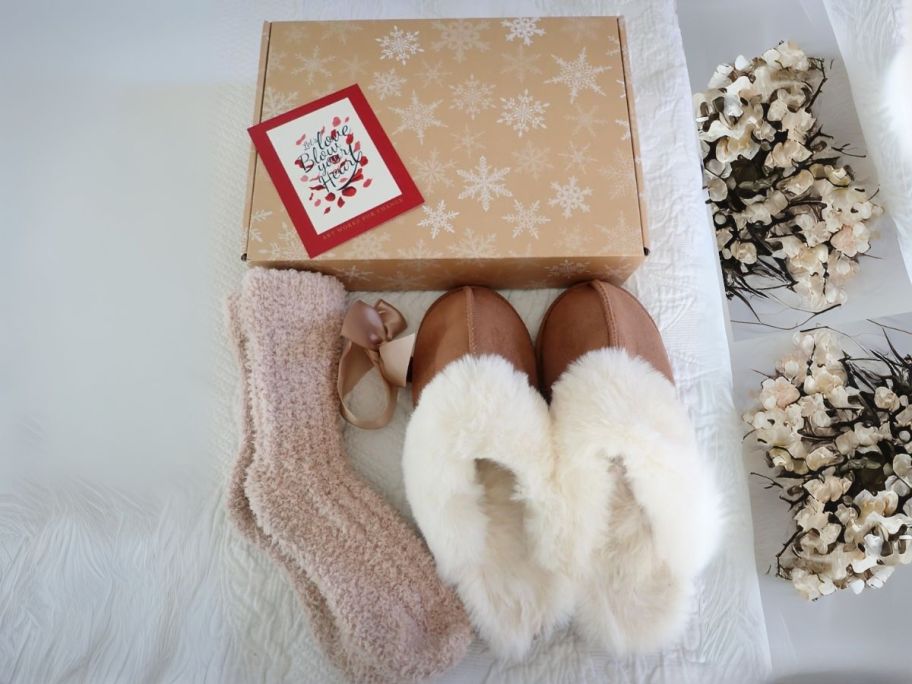 Slipper & Sock Gift Set on bed