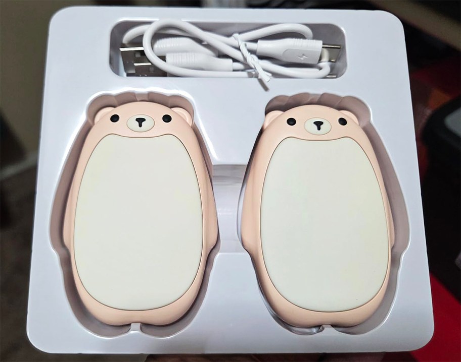 two pink bear handwarmers