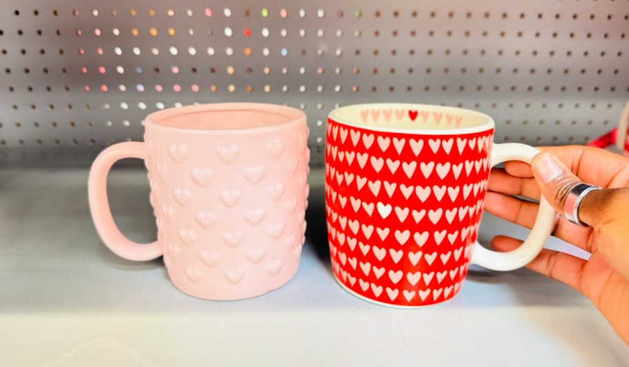 two heart print target valentines day mugs sitting side by side on the shelf