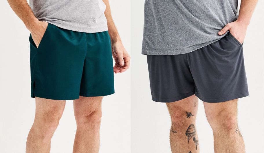 two models wearing tek gear mens shorts stock image