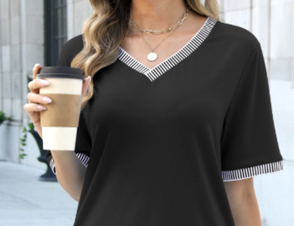 woman holding v-neck tee